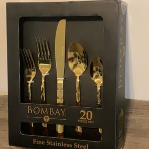 BOMBAY ARIELLA GOLD FINE STAINLESS 20pc. FLATWARE. NEW IN BOX